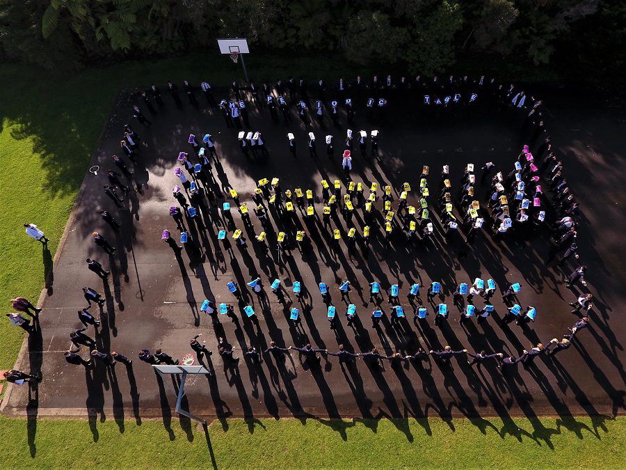 Students create a giant human periodic table